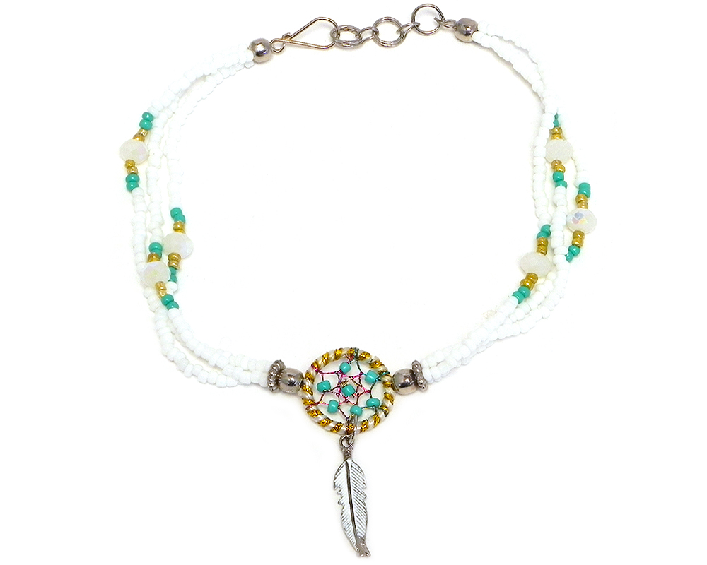 Handmade seed bead and crystal bead multi strand anklet with round beaded sparkle thread dream catcher and colored metal feather charm dangle in white, mint green, and gold color combination.