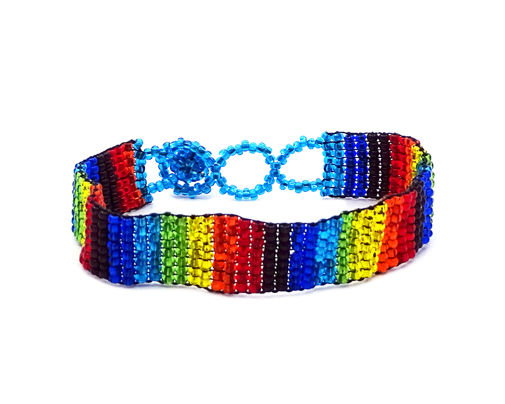 Handmade Czech glass seed bead thin strap bracelet with vertical striped pattern design in rainbow colors.