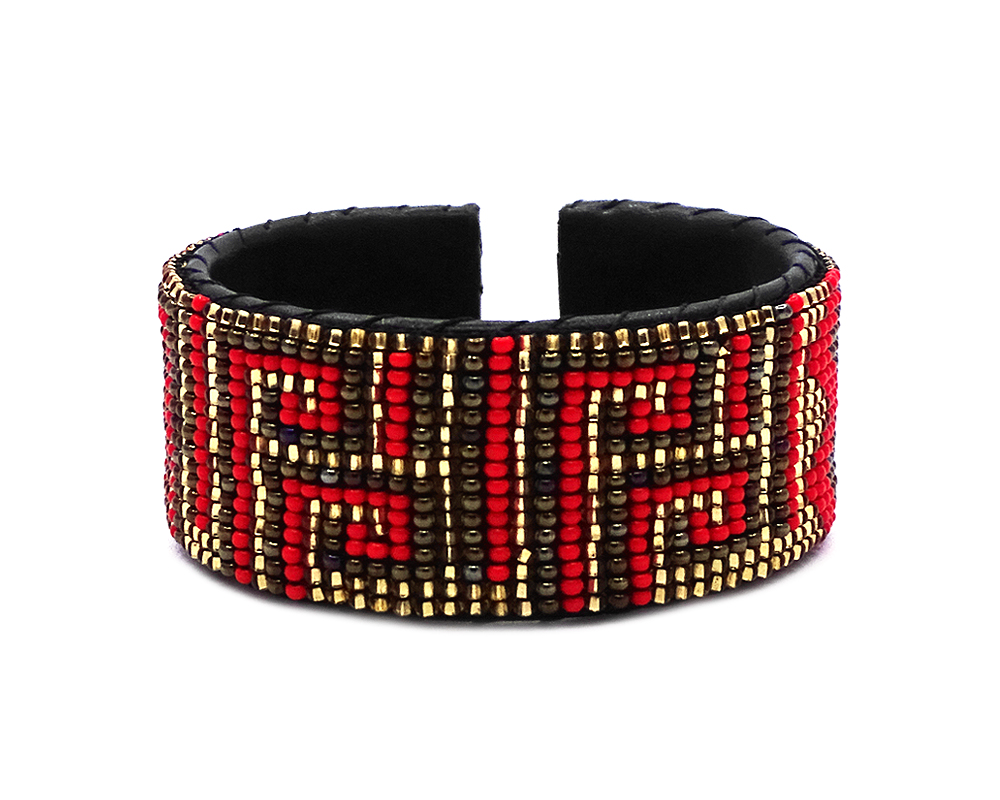Handmade Czech glass seed bead black leather cuff bracelet with tribal cube pattern design in red, gold, and brown color combination.
