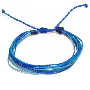 Handmade multicolored multi strand string pull tie bracelet in blue, turquoise, mint, and light blue color combination.