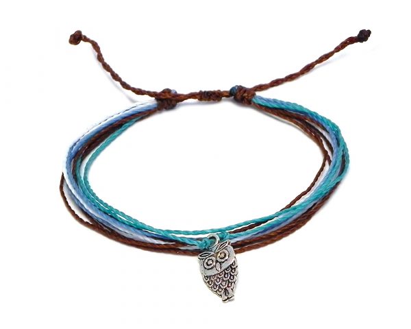 Handmade multicolored multi strand string pull tie bracelet with silver metal owl charm dangle in brown, turquoise, light blue, and white color combination.