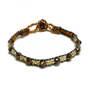 Handmade Czech glass seed bead and crystal bead thin strap bracelet in brown, dark brown, and gold color combination.