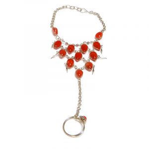 Handmade alpaca silver metal chain harem bracelet with multiple teardrop-shaped cat’s eye glass beads, linked to mini round stone ring in red color.