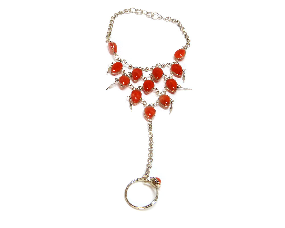 Handmade alpaca silver metal chain harem bracelet with multiple teardrop-shaped cat’s eye glass beads, linked to mini round stone ring in red color.
