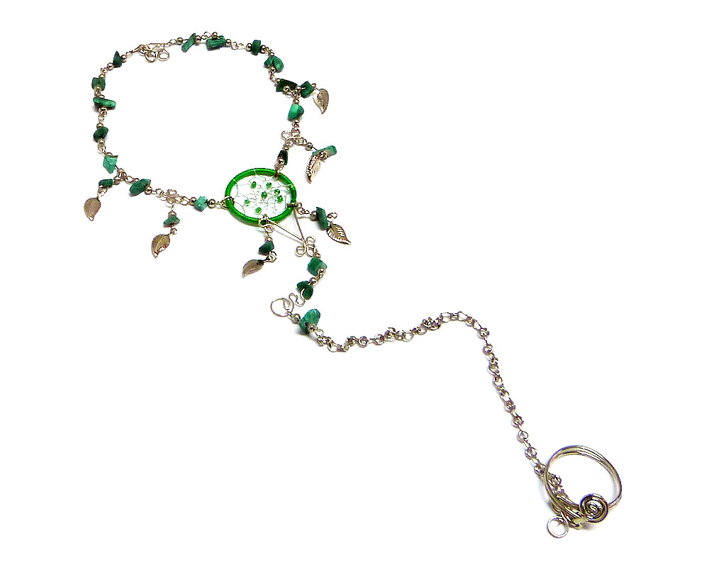 Handmade alpaca silver metal chain harem anklet with round beaded dream catcher, chip stones, and metal leaf charm dangles, linked to toe ring in green color.