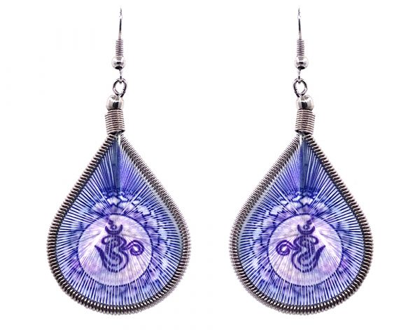 Teardrop-shaped thread dangle earrings with alpaca silver wire and om sign graphic image in blue and white color combination.