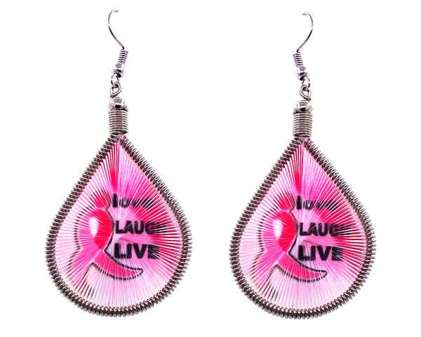 Teardrop-shaped thread dangle earrings with alpaca silver wire and breast cancer awareness graphic image in pink and black color combination.