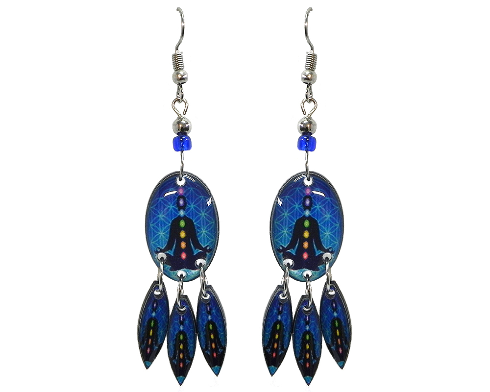 Oval-shaped New Age themed chakra graphic acrylic earrings with long matching dangles and beaded metal hooks in blue, black, and rainbow color combination.