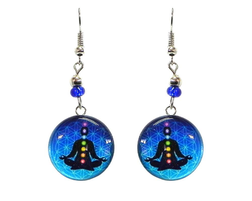 Round-shaped New Age themed chakra graphic acrylic dangle earrings with silver metal setting and beaded metal hooks in turquoise, blue, black, and rainbow color combination.