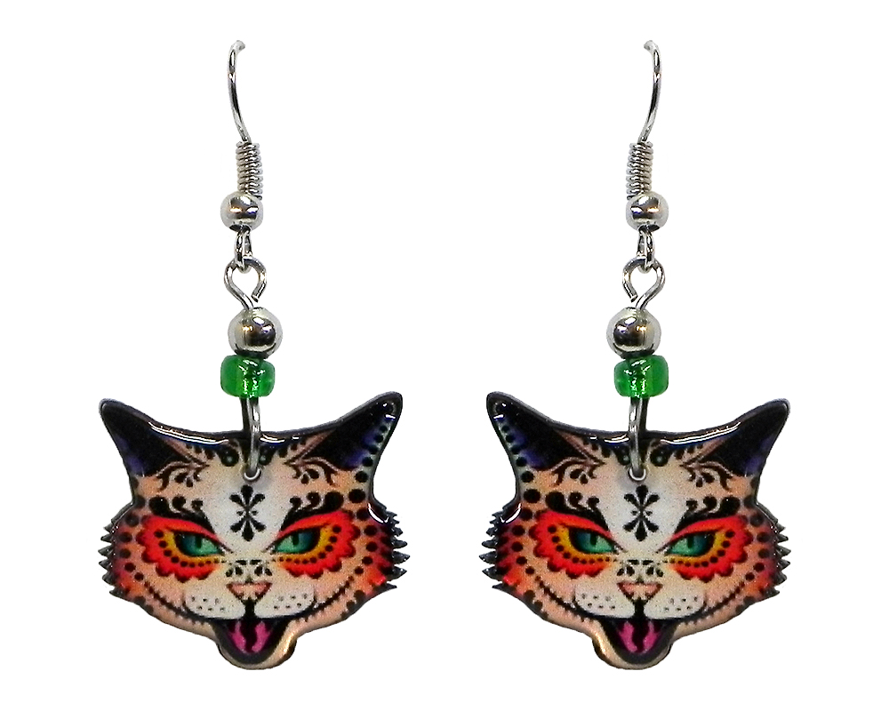 Tribal pattern sugar skull cat face acrylic dangle earrings with beaded metal hooks in orange, green, and black color combination.