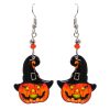 Halloween themed Jack O' Lantern pumpkin acrylic dangle earrings with beaded metal hooks in orange, black, and yellow.