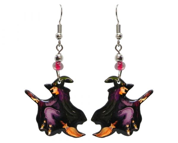 Halloween themed flying witch acrylic dangle earrings with beaded metal hooks in purple, black, and beige.