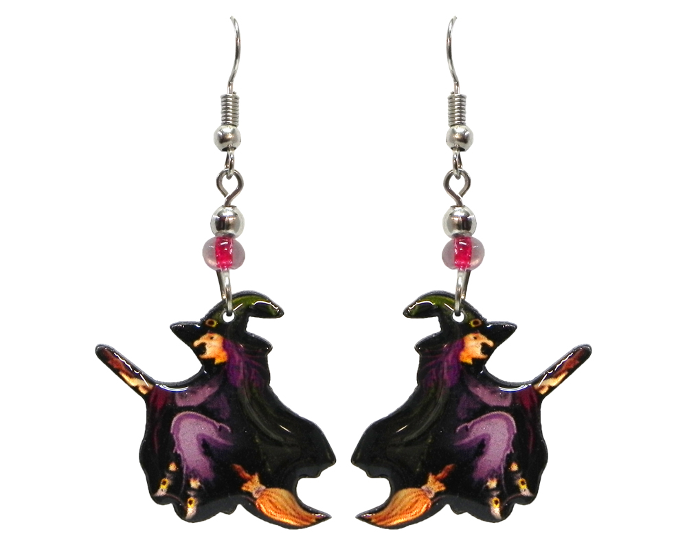 Halloween themed flying witch acrylic dangle earrings with beaded metal hooks in purple, black, and beige.