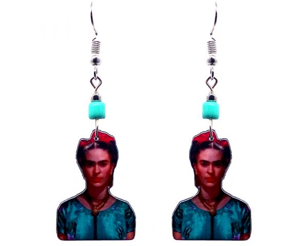 Handmade Frida inspired portrait earrings with acrylic, seed beads, and metal hooks in mint, teal green, hot pink, beige, and dark orange color combination.