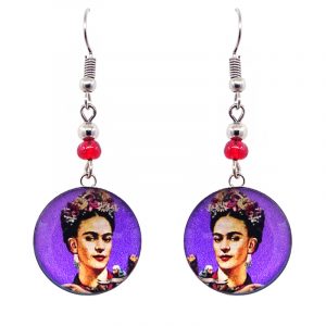 Handmade round silver Frida inspired earrings with acrylic, seed beads, and metal hooks in purple, peach, black, and pink color combination.
