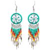 EA-050001440103 Handmade Native American inspired round beaded thread dream catcher earrings with long seed bead and alpaca silver dangles in mint green, gold, red, orange, and yellow color combination.