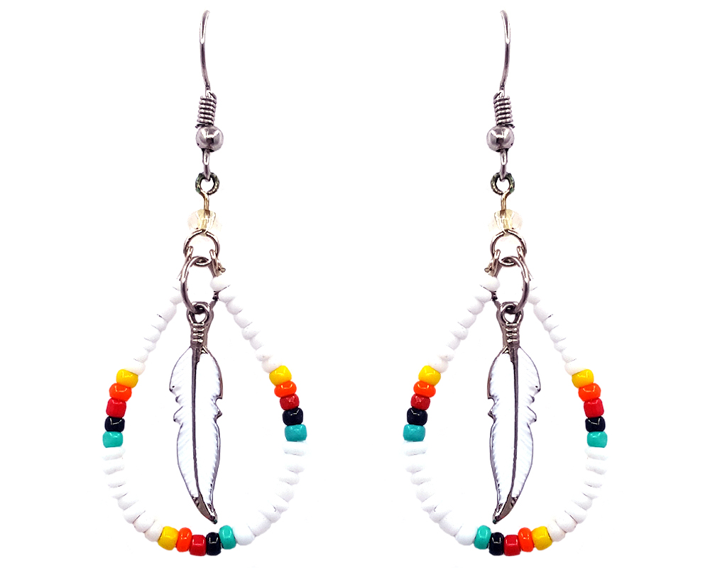 Handmade Native American inspired teardrop-shaped seed bead hoop earrings with colored metal feather charm inner dangle in white, yellow, orange, red, black, and mint green color combination.