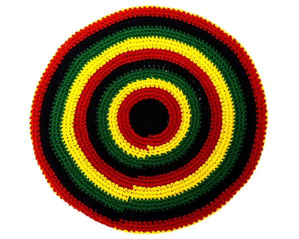 Handmade knit crochet knit tam beret beanie hat with geometric striped pattern in Rasta colors.