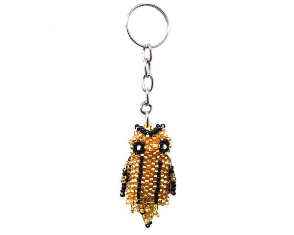 Handmade Czech glass seed bead figurine keychain of an owl bird in gold and black color combination.