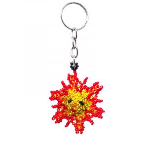 Handmade Czech glass seed bead figurine keychain of a sun with a face in golden yellow, orange, red, and black color combination.