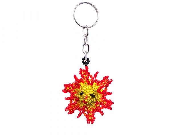 Handmade Czech glass seed bead figurine keychain of a sun with a face in golden yellow, orange, red, and black color combination.