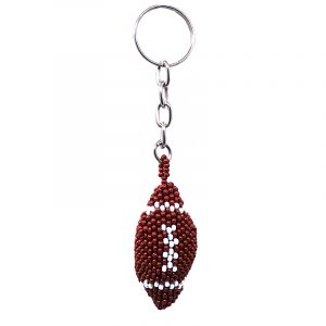 Handmade Czech glass seed bead figurine keychain of a football ball in brown and white color combination.