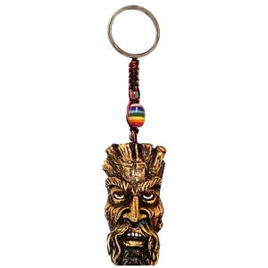 Handmade durepox resin figurine keychain of a brown tree man face.