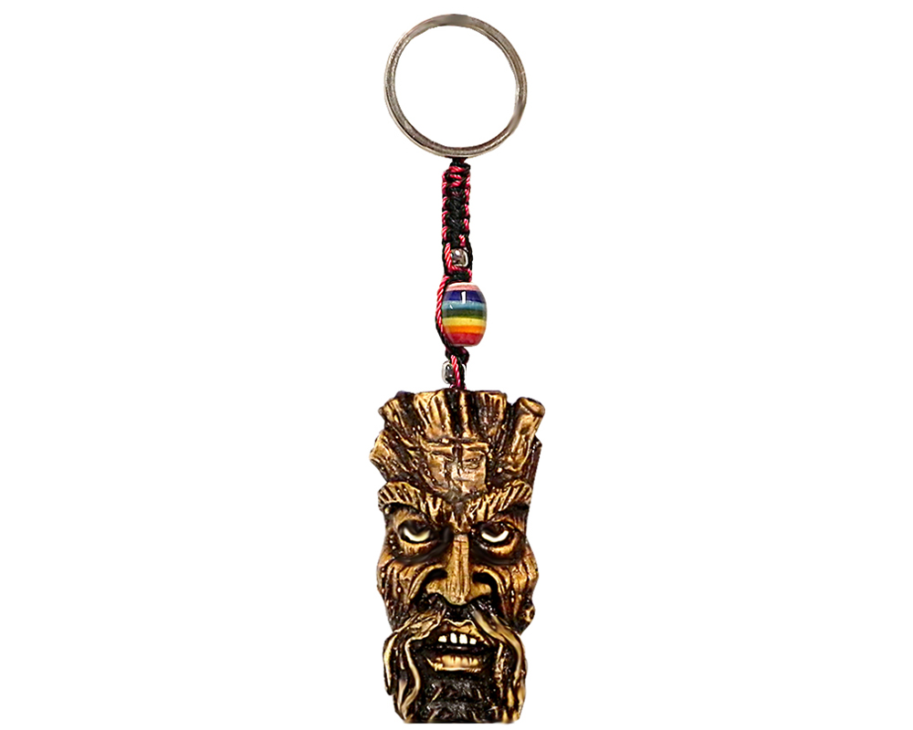 Handmade durepox resin figurine keychain of a brown tree man face.