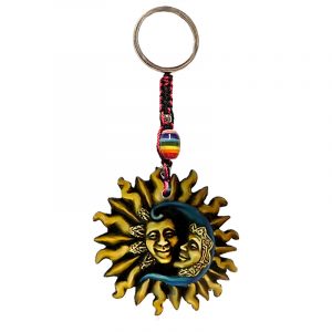Handmade durepox resin figurine keychain of a sun and crescent half moon in yellow and blue color combination.