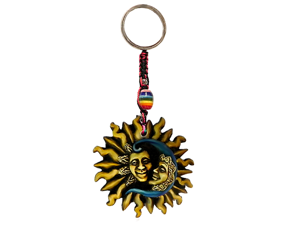Handmade durepox resin figurine keychain of a sun and crescent half moon in yellow and blue color combination.