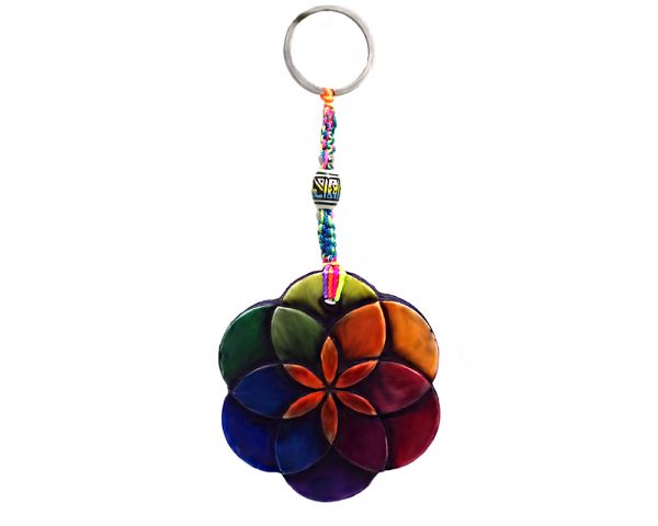 Handmade durepox resin figurine keychain of a seed of life symbol in rainbow colors.