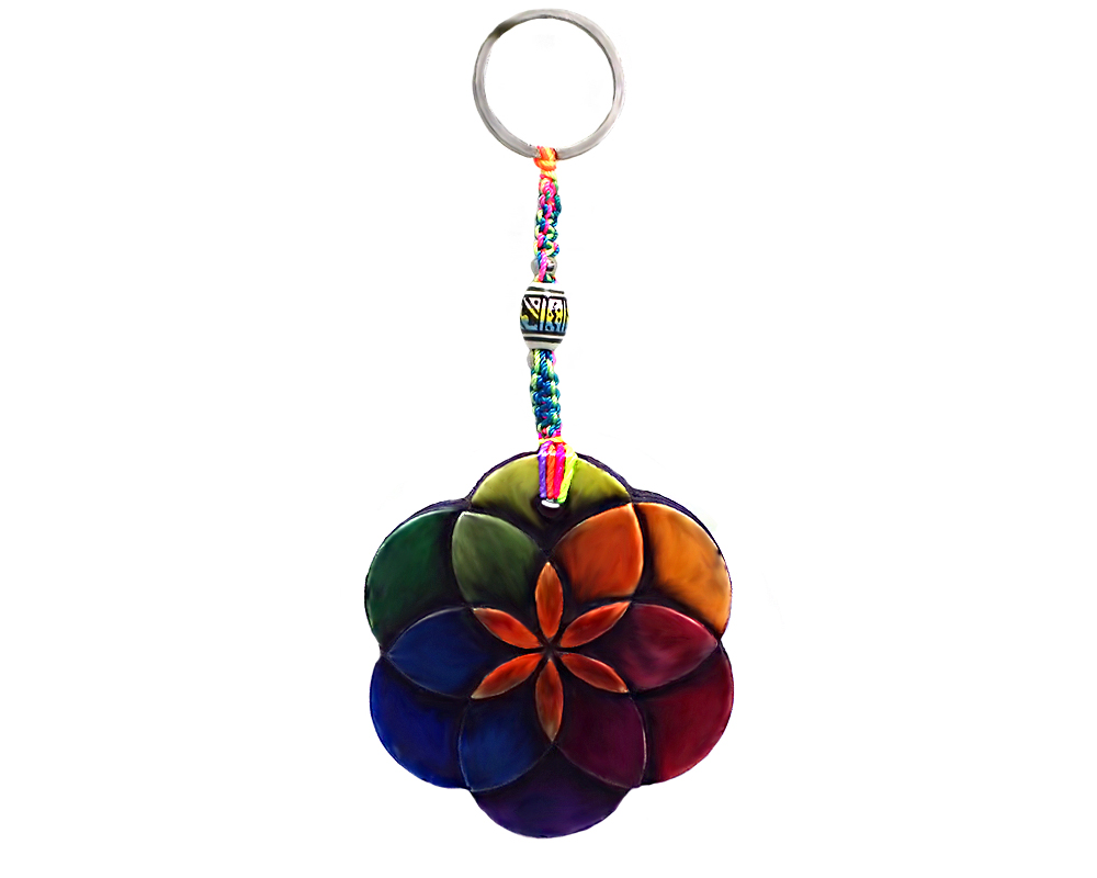 KC-05030401 Handmade durepox resin figurine keychain of a seed of life symbol in rainbow colors.