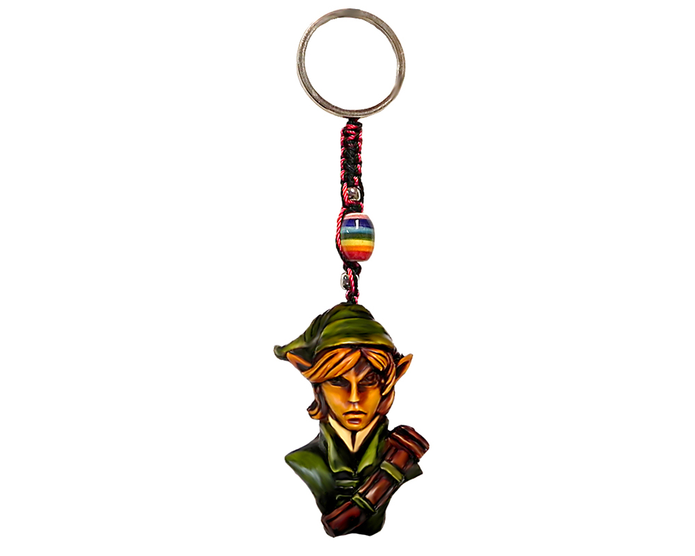 Handmade durepox resin figurine keychain of an elf with a green outfit.