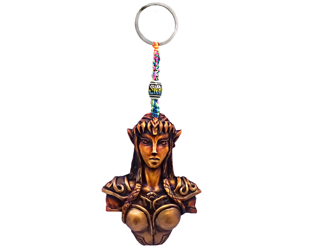 Handmade durepox resin figurine keychain of a gold female elf warrior.