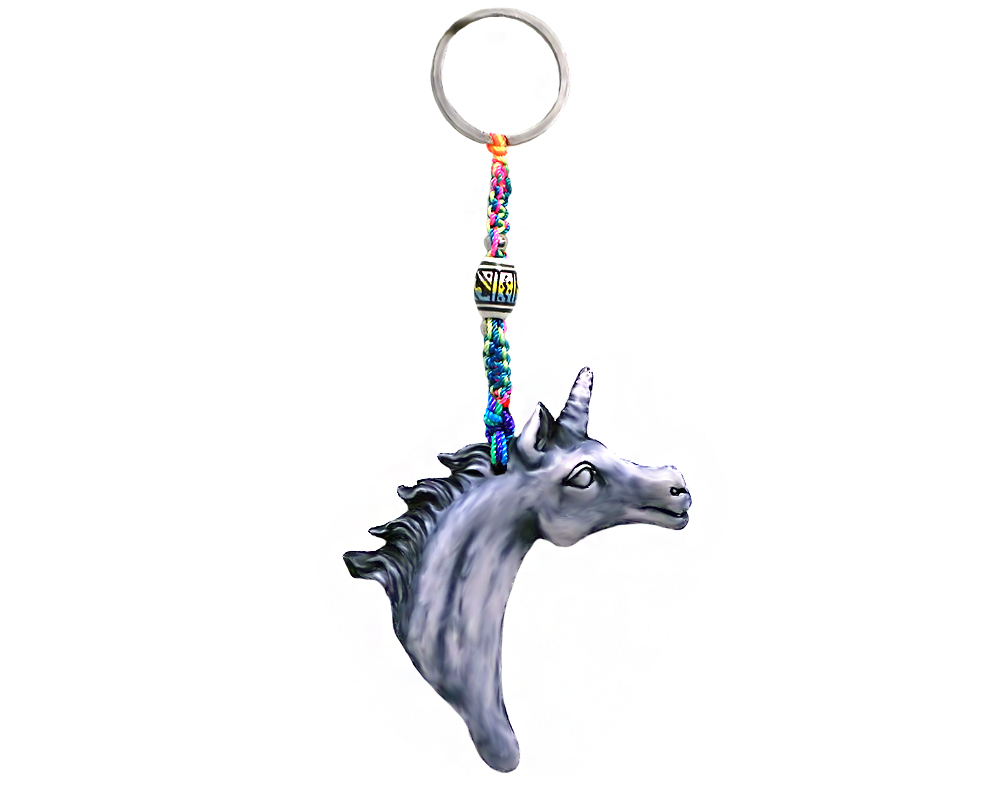 KC-05040401 Handmade durepox resin figurine keychain of a white and gray unicorn head.