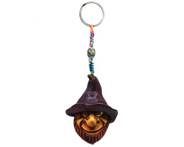 Handmade durepox resin figurine keychain of a smiling bearded gnome head wearing a red hat.