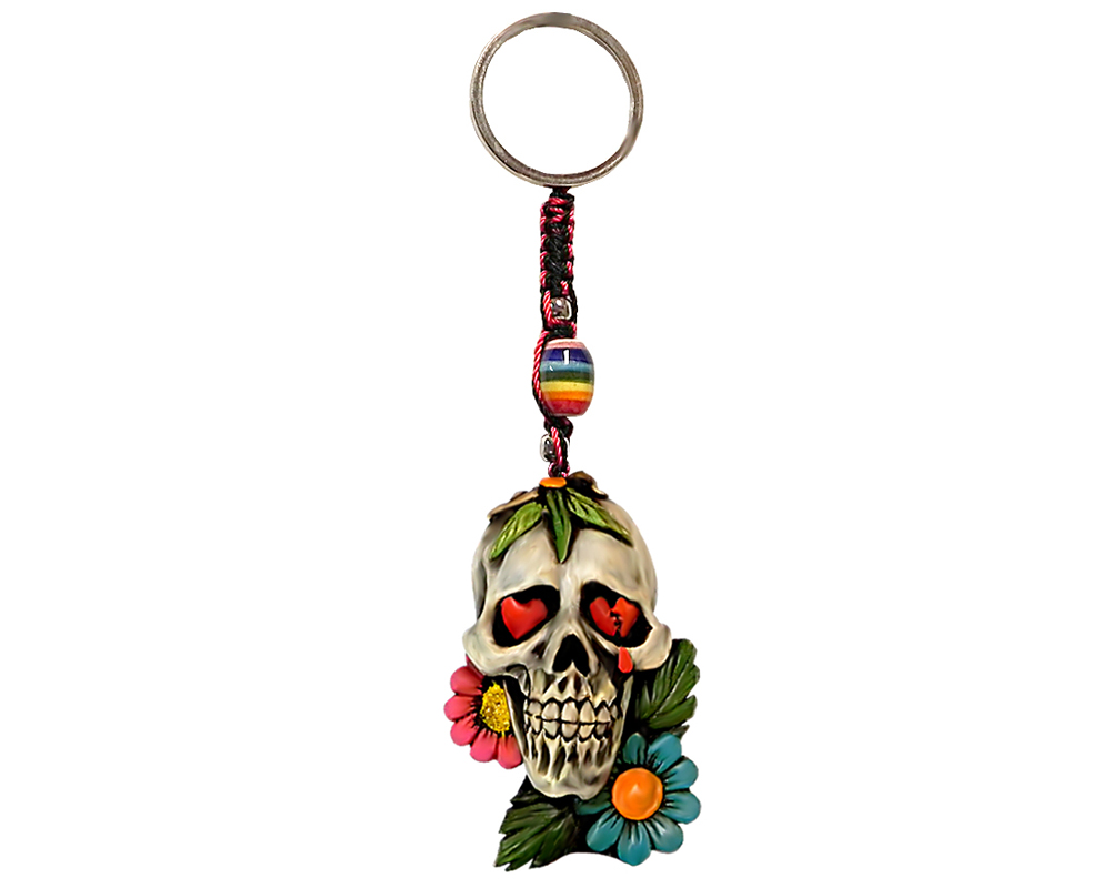 KC-05050203 Handmade durepox resin figurine keychain of a white sugar skull with red heart eyes and multicolored flowers.