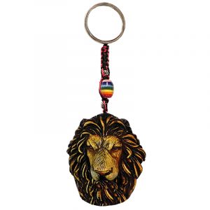 Handmade durepox resin figurine keychain of a lion head in beige color.