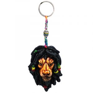 Handmade durepox resin figurine keychain of a lion head with a dreaded mane and Rasta colors.
