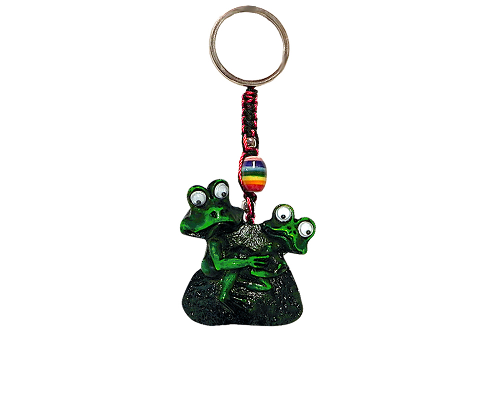 Handmade durepox resin figurine keychain of two horny green frogs with googly eyes.