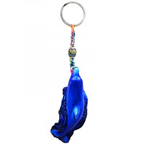 Handmade durepox resin figurine keychain of a swimming blue dolphin.