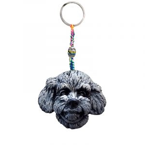 Handmade durepox resin figurine keychain of a white Bichon Frise dog head.
