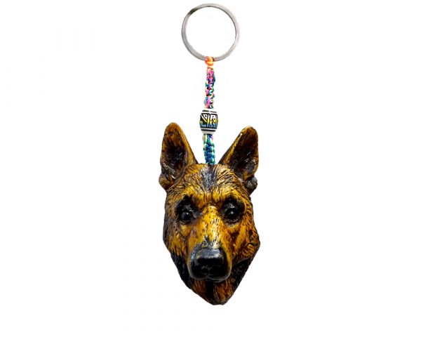 Handmade durepox resin figurine keychain of a German Shepherd dog head.
