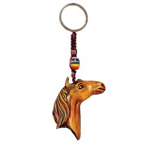 Handmade durepox resin figurine keychain of a beige horse head.
