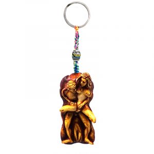 Handmade durepox resin figurine keychain of a man and woman couple in reverse crab sex position.