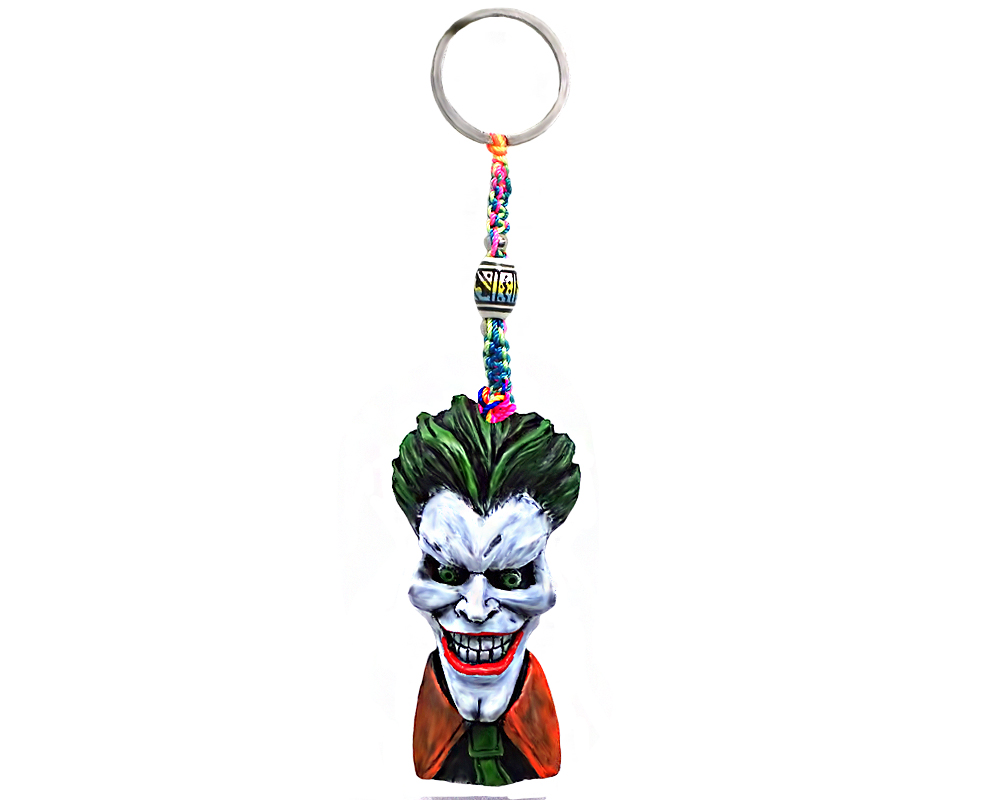 KC-05080101 Handmade durepox resin figurine keychain of an evil clown character with a big head, creepy smile, green hair, and suit.