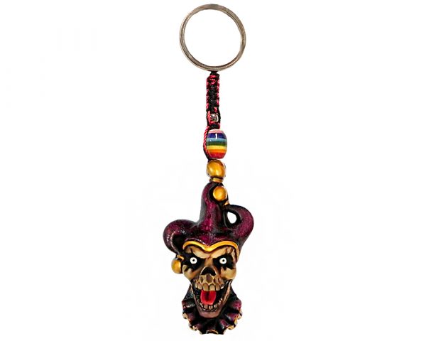 Handmade durepox resin figurine keychain of an evil jester head sticking tongue out with purple and gold suit.
