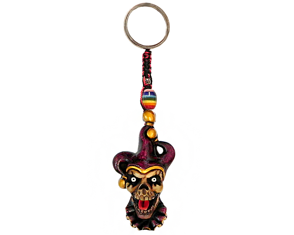 KC-05080103 Handmade durepox resin figurine keychain of an evil jester head sticking tongue out with purple and gold suit.