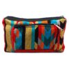 Rectangle-shaped fanny pack bag with Aztec inspired tribal print pattern in red, orange, light yellow, teal green, turquoise blue, and black color combination.
