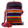 Handmade medium-sized slim square-shaped purse bag with multicolored tribal print striped pattern material (or manta Inca) and fringe in rainbow colors.